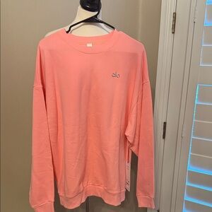 ALO Yoga bubble gum color Pink women’s sweatshirt size LG NEW with tags